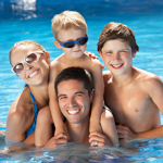 Family of four in the pool