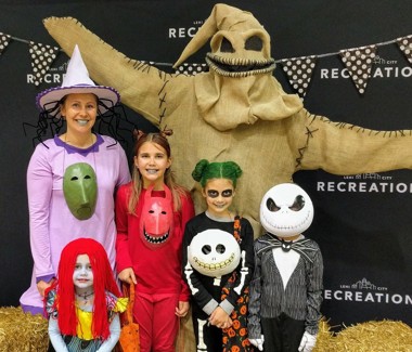 Family at Halloween Extravaganza in Nightmare Before Christmas costumes