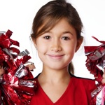 Adorable happy little child wearing cheerleader outfit