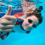 Boy swimming underwater