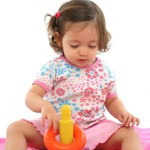 Toddler playing with toy
