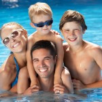 Family of four in the pool