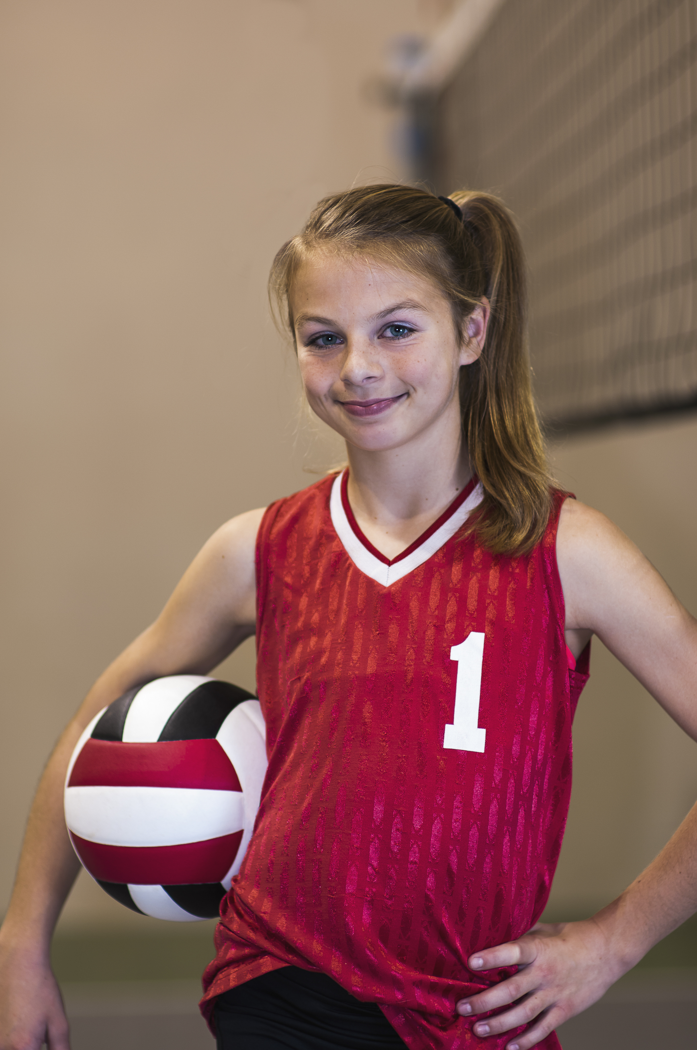 Teenaged girl on volleyball court