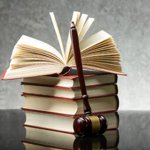 stack of books and a gavel
