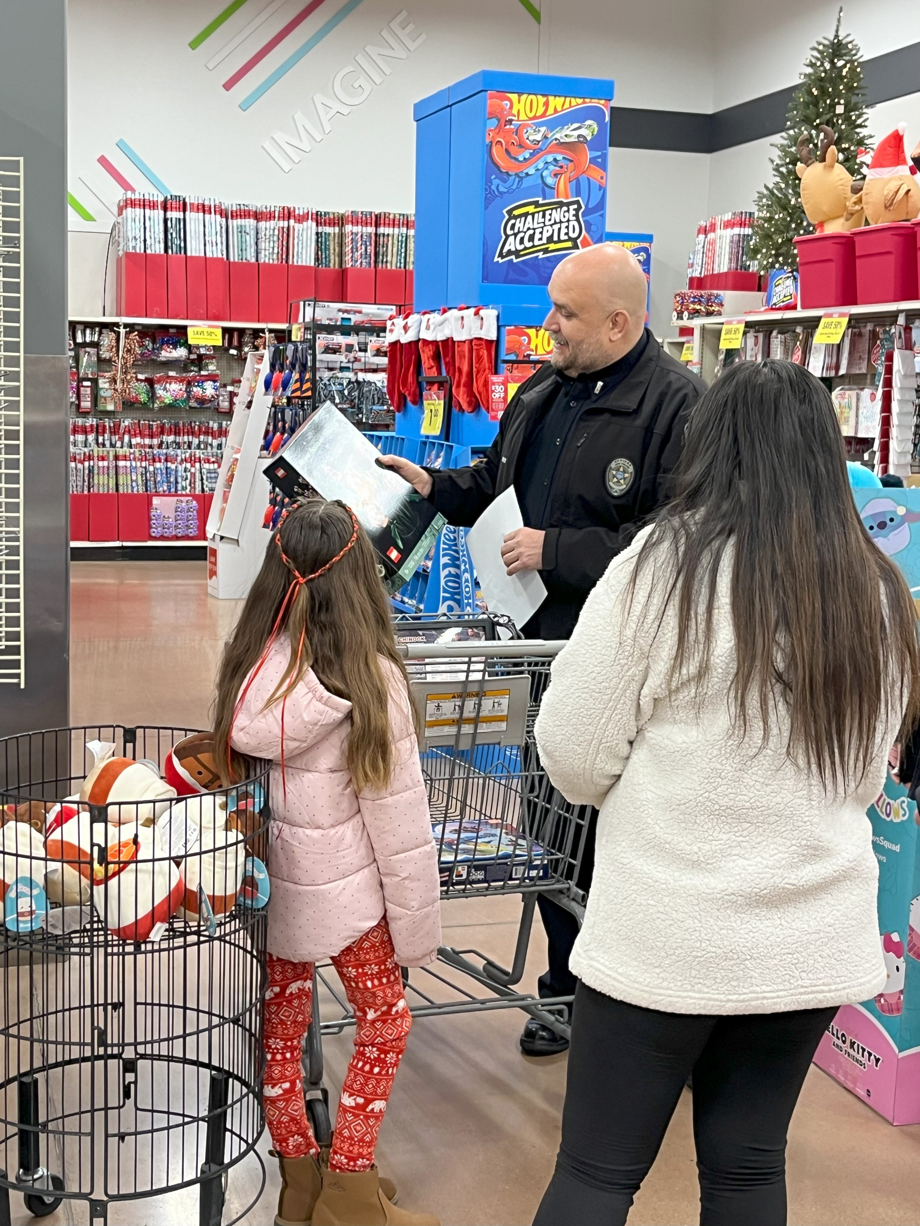 Local Lehi kids attends the Kid Cops, Christmas event.